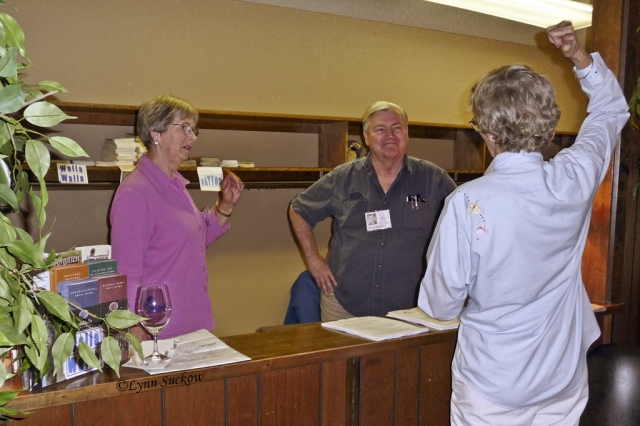 Susan Baker and Steve Singleton ready to register attendees as Ann Ray explains something--at the Elks.