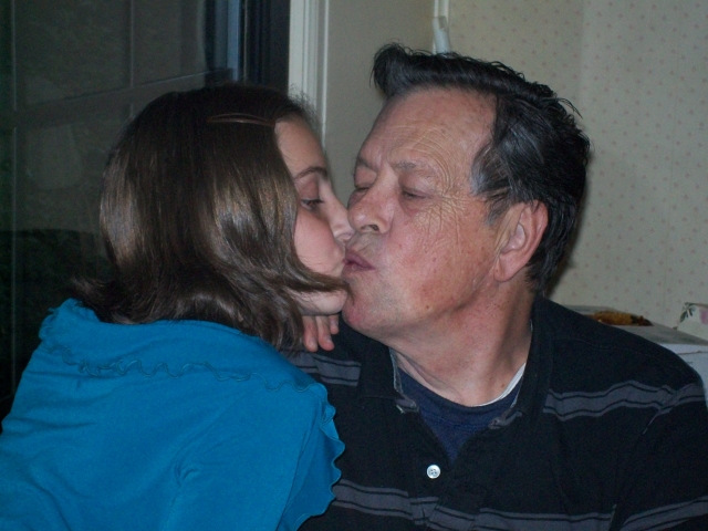 This is my daddy and I kissing before my track banquet. Delwyn Fisher age 68 with daughter Alissa Fisher age 12.