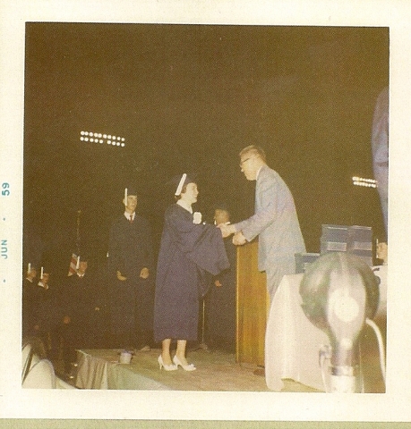 Judy Durand receiving diploma